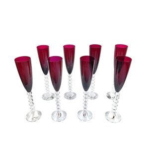 Suite de 8 flûtes en cristal de Baccarat Rubis, modèle Flutissimo Véga.